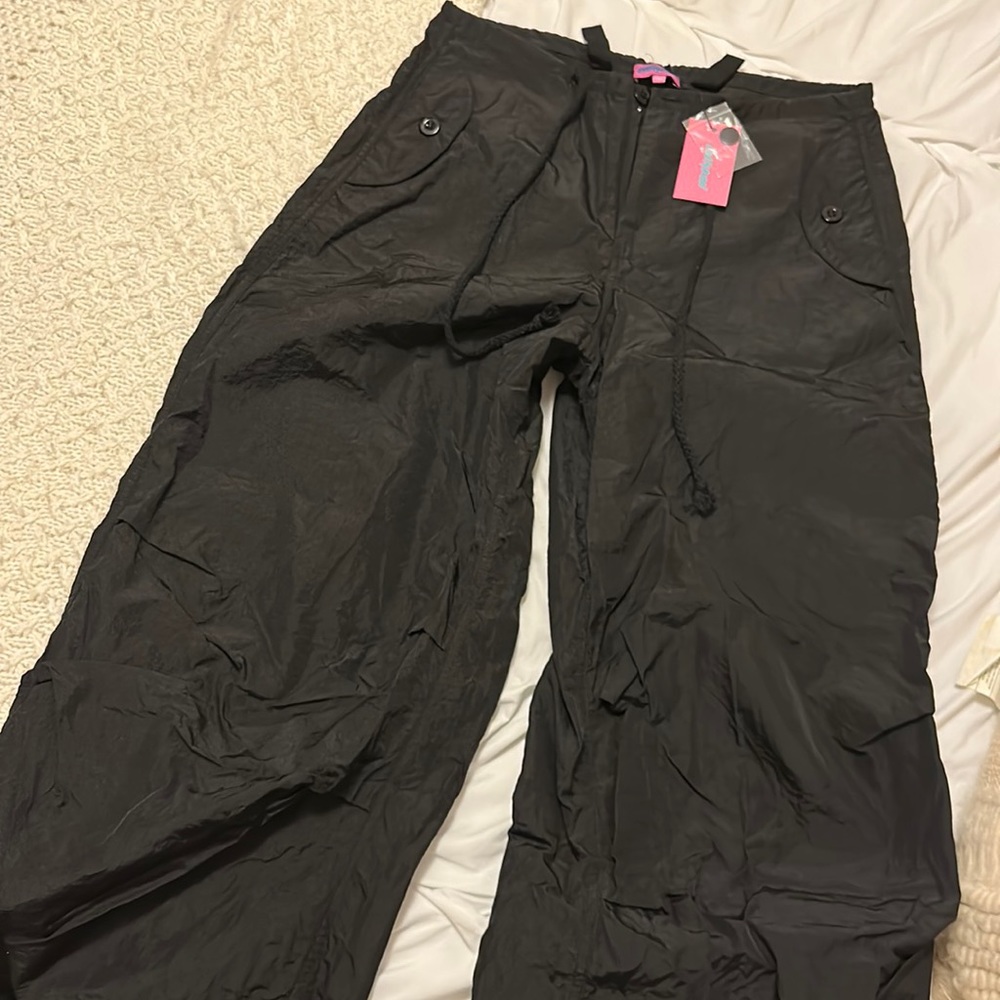 Black parachute pants